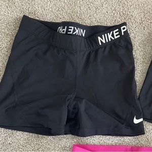 nike pros. size M.